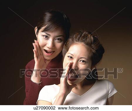 Two Yelling Young Women, Front View, Looking at Camera View Large Photo Image Stock Image - Two Yelling Young Women, Front View, Looking at Camera. Fotosearch