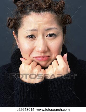 Young Woman Feeling Cold, Front View, Looking at Camera View Large Photo Image Stock Photography - Young Woman Feeling Cold, Front View, Looking at Camera. Fotosearch