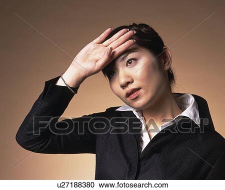 Stock Image - Young Woman Feeling Sick, Low Angle View. Fotosearch
