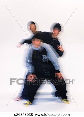 Stock Photo - Group of three young adult man dancing, Vignette, Portraint. Fotosearch