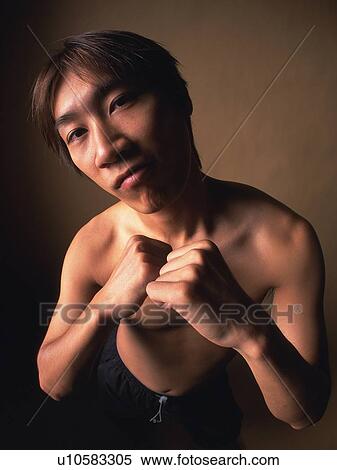 Young adult man fighting pose, Portraint View Large Photo Image Stock Photography - Young adult man fighting pose, Portraint. Fotosearch