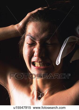 Young adult man sweating, Head and Shoulders, Portraint View Large Photo Image Stock Photography - Young adult man sweating, Head and Shoulders, Portraint. Fotosearch