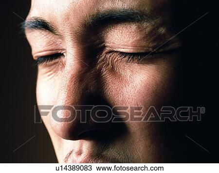 Young adult man with closed eyes, Close Up, Portraint View Large Photo Image Stock Image - Young adult man with closed eyes, Close Up, Portraint. Fotosearch