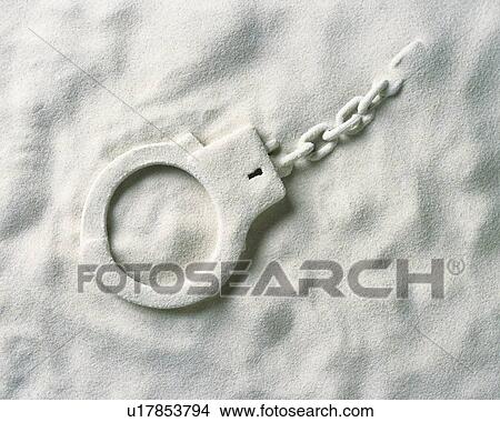 Picture - Sand Craft of Handcuffs, High Angle View. Fotosearch