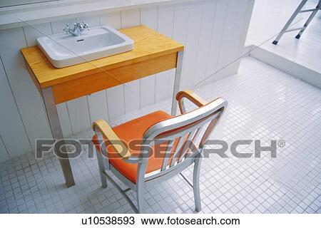 Closed Up Image of a Washstand and a Chair, Orange-colored, High Angle View View Large Photo Image Stock Image - Closed Up Image of a Washstand and a Chair, Orange-colored, High Angle View. Fotosearch