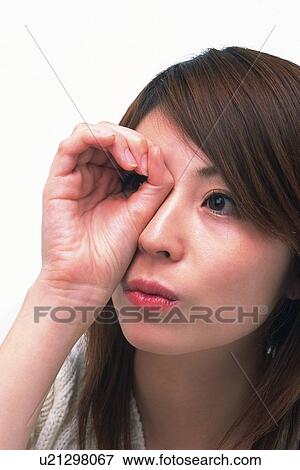 Closed Up Image of a Young Adult Woman Making a Whole With a Hand and Peeping Through it, Side View View Large Photo Image Stock Photo - Closed Up Image of a Young Adult Woman Making a Whole With a Hand and Peeping Through it, Side View. Fotosearch