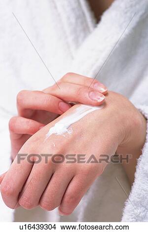 Closed Up Image of Female Hands Applying some Hand Cream, Front View, Differential Focus View Large Photo Image Picture - Closed Up Image of Female Hands Applying some Hand Cream, Front View, Differential Focus. Fotosearch