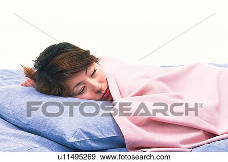 Young Adult Woman Sleeping with a Pink Blanket, Side View, High Angle View View Large Photo Image Stock Photo - Young Adult Woman Sleeping with a Pink Blanket, Side View, High Angle View. Fotosearch