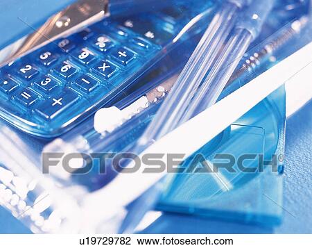 Stock Image - Close up of blue stationeries. Fotosearch