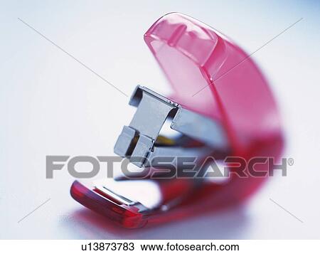 Close up of pink stapler View Large Photo Image Stock Image - Close up of pink stapler. Fotosearch