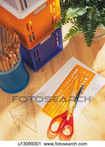 Stock Image - Colorful stationeries and piled up boxes. Fotosearch