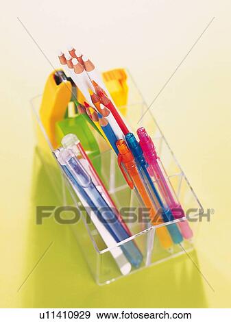 Stock Photo - Colorful stationeries orderly put in holder. Fotosearch