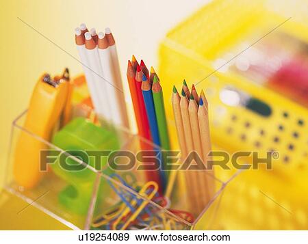 Stock Photo - Colorful stationeries orderly put in holder. Fotosearch