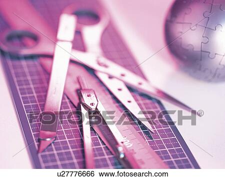 Drafting instruments and sphere shaped puzzle in purple View Large Photo Image Stock Photograph - Drafting instruments and sphere shaped puzzle in purple. Fotosearch
