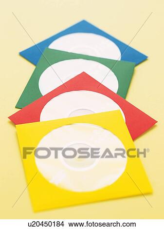 Four CDs in colorful cases arranged in a row View Large Photo Image Picture - Four CDs in colorful cases arranged in a row. Fotosearch