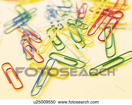 Scattered colorful clips View Large Photo Image Stock Image - Scattered colorful clips. Fotosearch