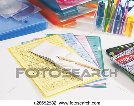 Stationeries and files on desk View Large Photo Image Stock Image - Stationeries and files on desk. Fotosearch