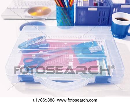 Stationeries in plastic bag on desk View Large Photo Image Stock Photo - Stationeries in plastic bag on desk. Fotosearch