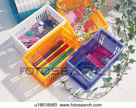 Stock Image - Stationeries put in boxes. Fotosearch