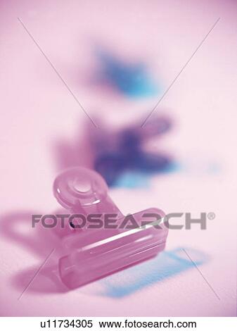 Stock Photography - Three colored paperclips. Fotosearch