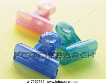 Stock Photography - Three colored paperclips. Fotosearch