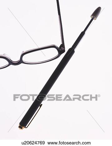 Stock Photo - Glasses and pointer stick, high angle view, white background. Fotosearch