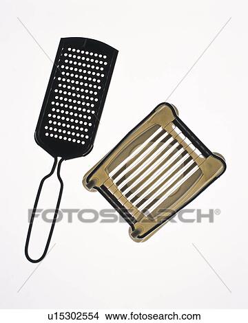 Grater and egg slicer, high angle view, white background View Large Photo Image Picture - Grater and egg slicer, high angle view, white background. Fotosearch