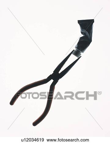 Nipper and bent tube, front view, white background View Large Photo Image Stock Photo - Nipper and bent tube, front view, white background. Fotosearch