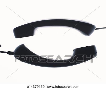 Stock Photo - Phone receivers, side view, white background. Fotosearch