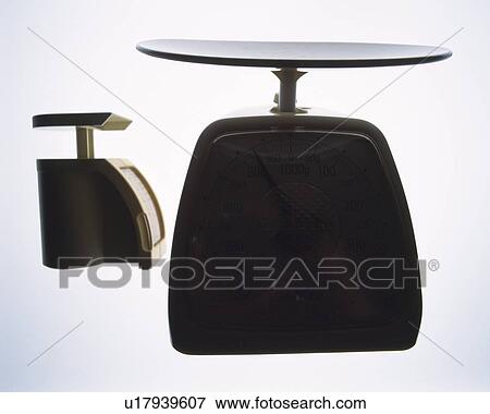 Stock Photo - Silhouette of two weighing scales, white background. Fotosearch