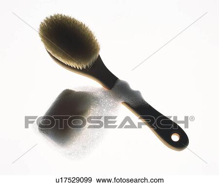 Stock Photo - Soap and brush, high angle view, white background. Fotosearch