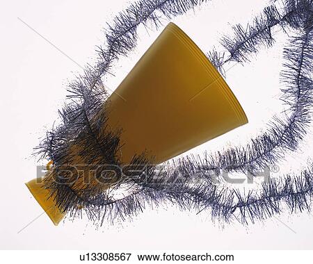 Yellow megaphone with ornament, high angle view, white background View Large Photo Image Stock Photo - Yellow megaphone with ornament, high angle view, white background. Fotosearch