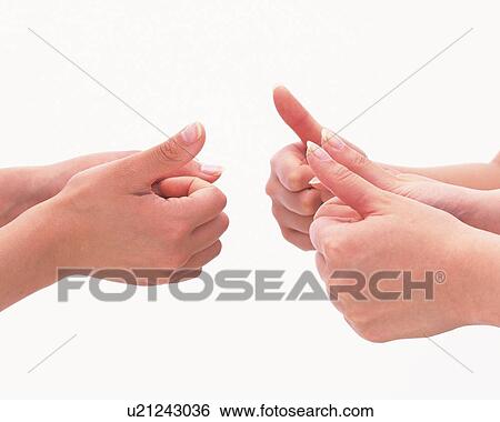 Stock Photograph - Hands of people with thumbs up. Fotosearch