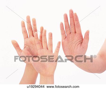 Three people lifting up hands View Large Photo Image Picture - Three people lifting up hands. Fotosearch