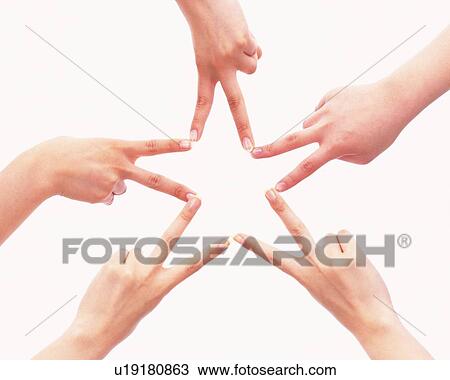 Stock Image - Three people making star with hands. Fotosearch