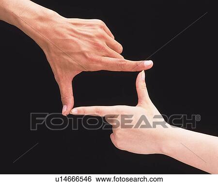 Woman and man making rectangle with hands View Large Photo Image Stock Photograph - Woman and man making rectangle with hands. Fotosearch