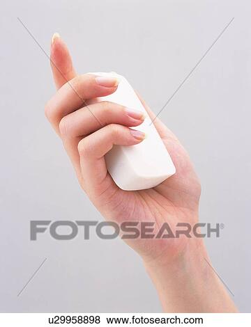 Stock Photo - Woman holding a soap. Fotosearch