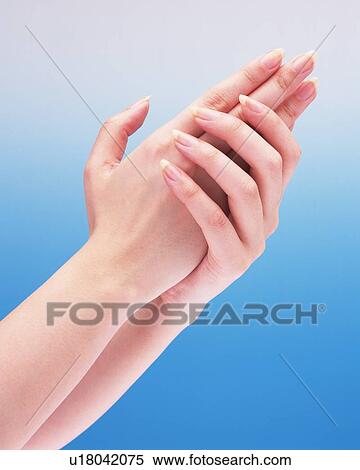 Woman holding the other hand of her View Large Photo Image Stock Photography - Woman holding the other hand of her. Fotosearch