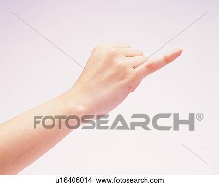 Picture - Woman putting her pinkie out. Fotosearch