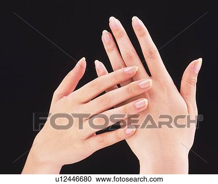 Woman touching hand View Large Photo Image Stock Image - Woman touching hand. Fotosearch