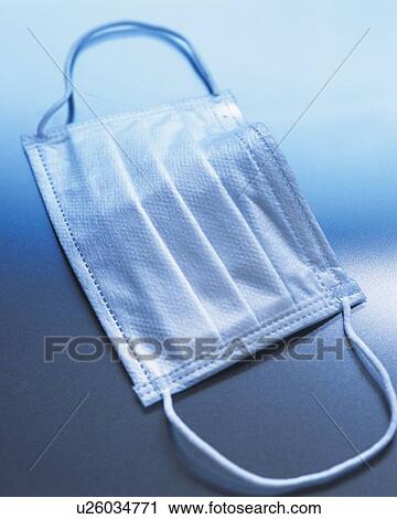 Stock Image - A medical mask . Fotosearch