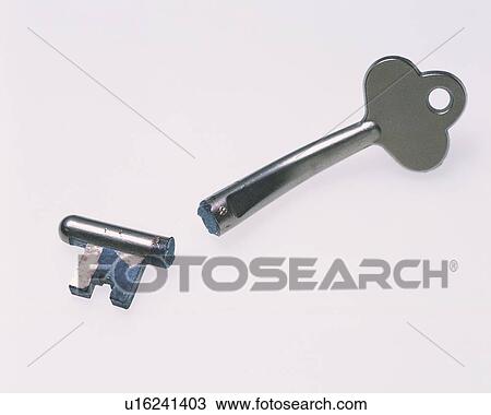 Stock Image - Broken antique key. Fotosearch