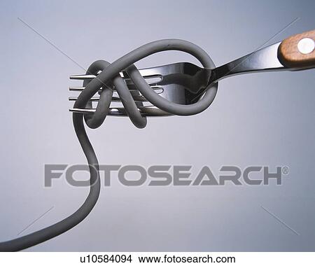 Picture - Cord twisting around fork. Fotosearch