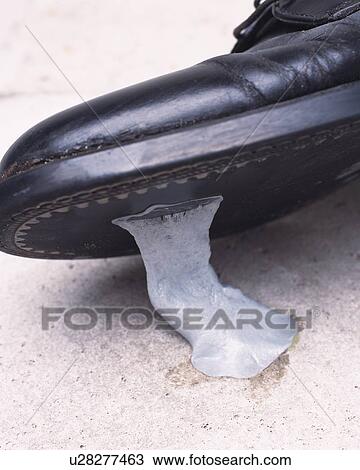 Stock Image - Man stepped on gum. Fotosearch