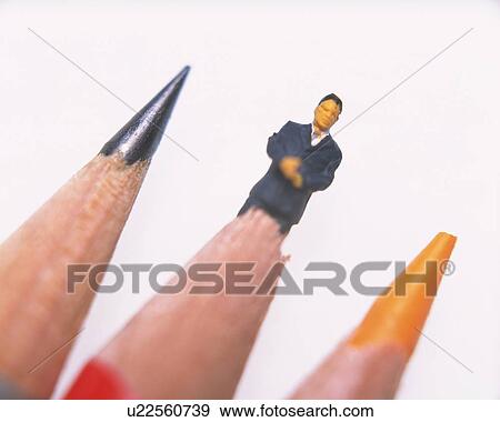 Toy figurine of man and three pencils, one of the pencils is broken View Large Photo Image Stock Photo - Toy figurine of man and three pencils, one of the pencils is broken. Fotosearch