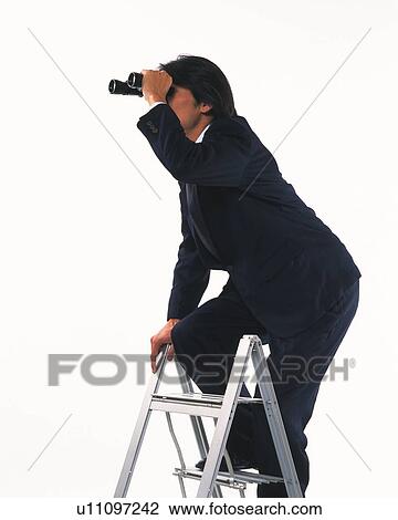 Stock Image - Image of a Businessman Looking Through Binoculars While Standing on a Stepladder, Side View. Fotosearch