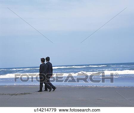 Image of Two Businessmen Walking Along the Beach, Side View, Rear View View Large Photo Image Stock Photo - Image of Two Businessmen Walking Along the Beach, Side View, Rear View. Fotosearch