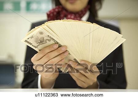 Businesswoman Counting a money View Large Photo Image Stock Image - Businesswoman Counting a money. Fotosearch
