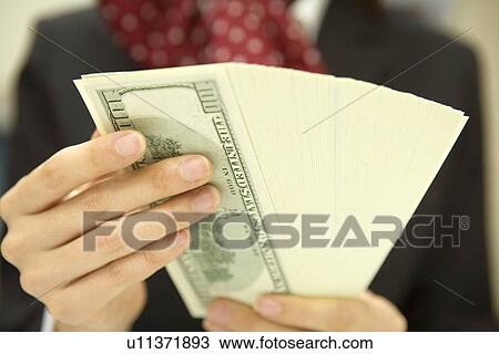 Businesswoman Counting a money View Large Photo Image Stock Image - Businesswoman Counting a money. Fotosearch