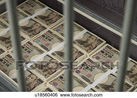 Stock Photograph - Wads of Money. Fotosearch